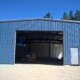 Paradigm metal shop front side